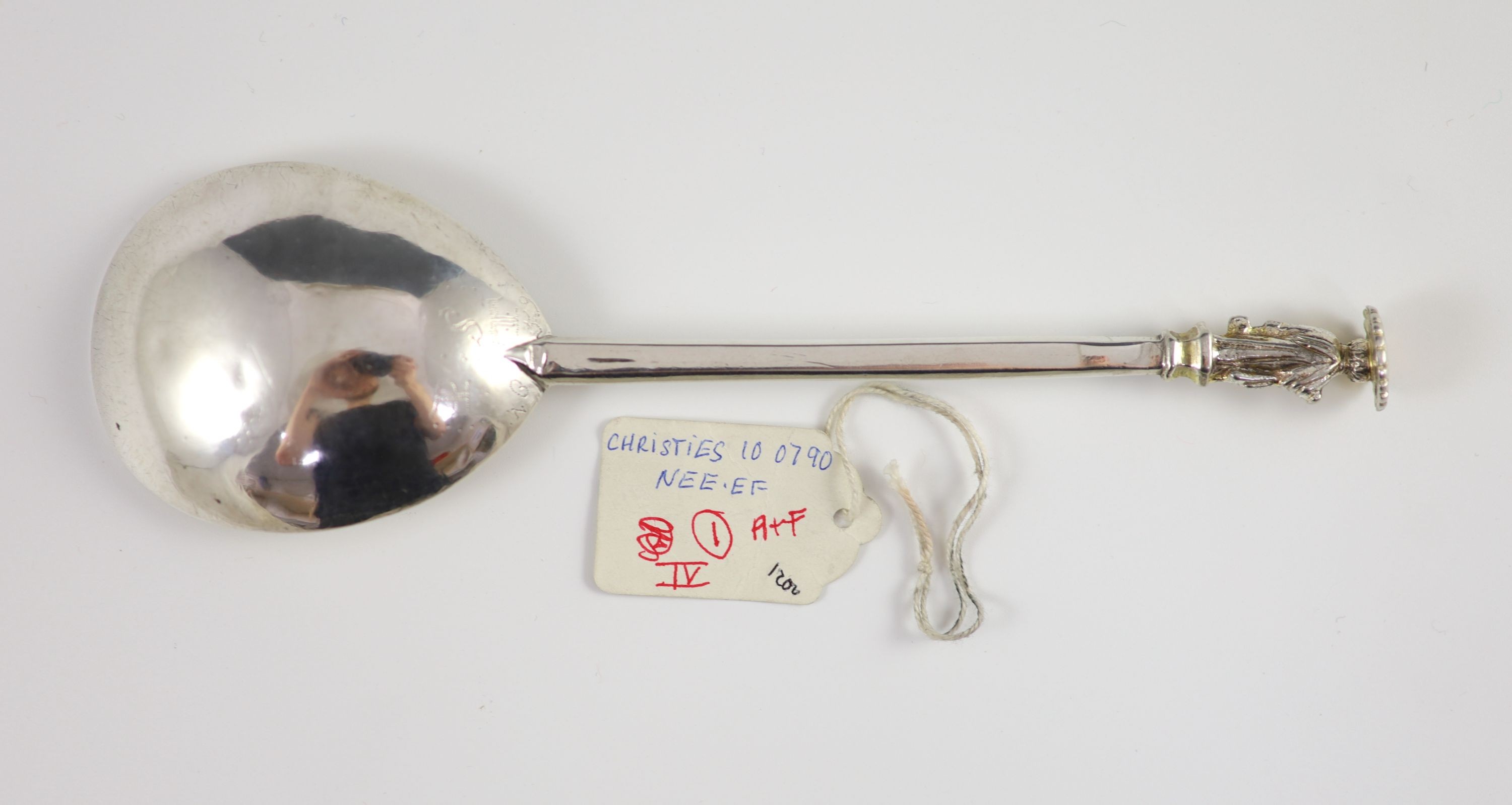 A Commonwealth West Country silver Apostle spoon, with a gilded terminal in the form of St. Peter, the bowl inscribed ‘P.S.T’, and dated ‘1659’, unascribed, c1650, 20cm long, 2 oz, (repaired to terminal.).